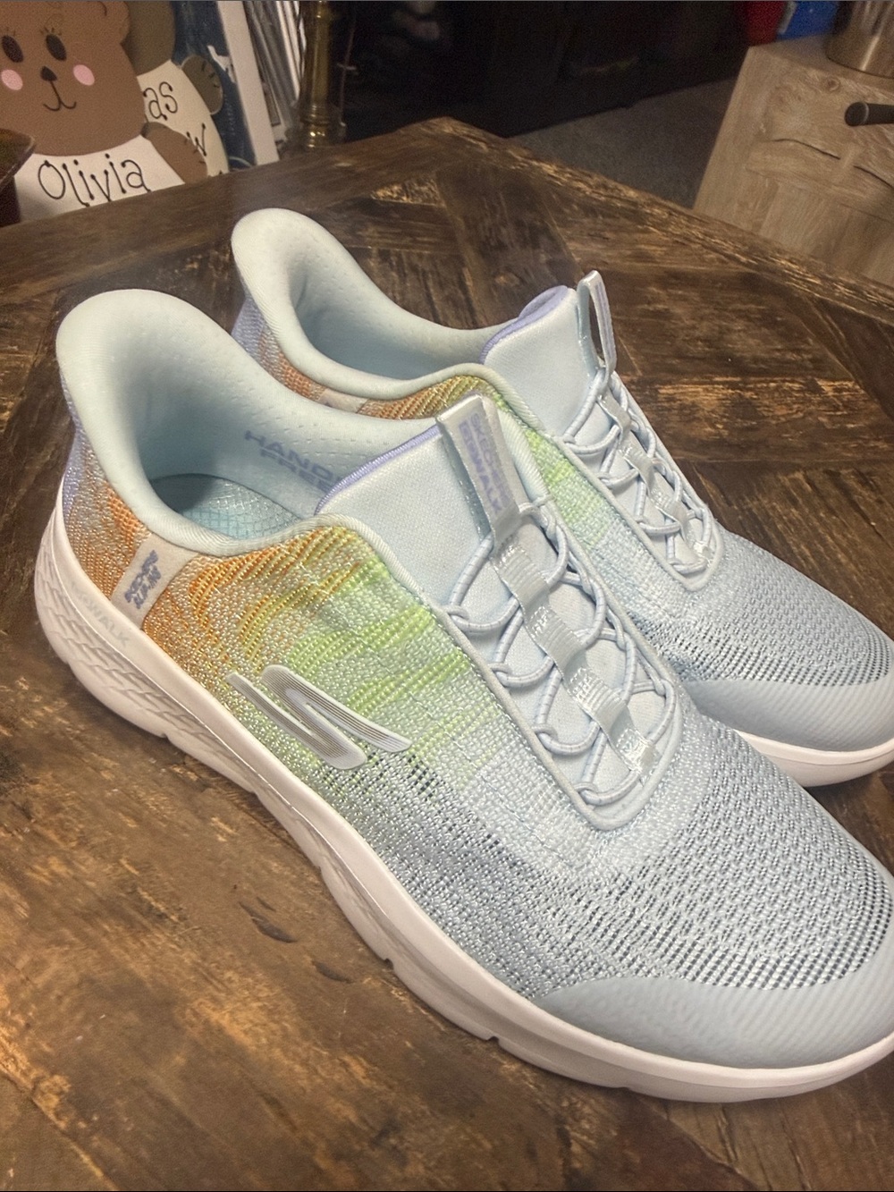 Skechers Women’s Light Blue Knit Slip-On Sneakers with Pastel Rainbow Accent